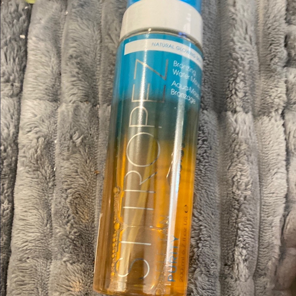 St. Tropez Aqua Bronzing Gel with Blue and Orange Design